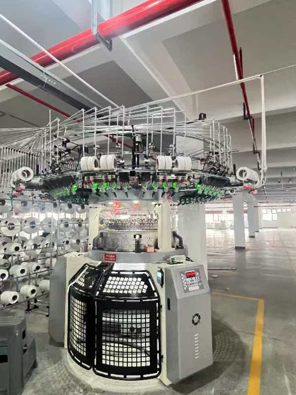 ![Circular knitting machine in factory, high-speed textile production equipment for yarn feeding-Postive yarn feeder](#placeholder_link "Circular Knitting Machine")
